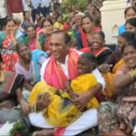 Telangana minister lifts elderly woman in arms during campaign