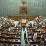 Two men jump from visitor’s gallery in Lok Sabha, lit smoke sticks, say MPs