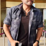 Venkatesh Daggubati aces airport look with checkered shirt and denims