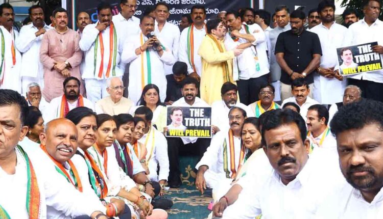 Revanth Reddy protested Against Adani Group After signing MoU At Davos