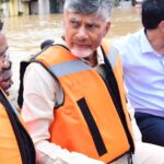 Chandrababu Naidu visits flood-affected Vijayawada in a boat