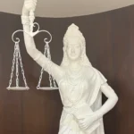 Justice Statue With Open Eyes, Constitution Replaces sword on Hand