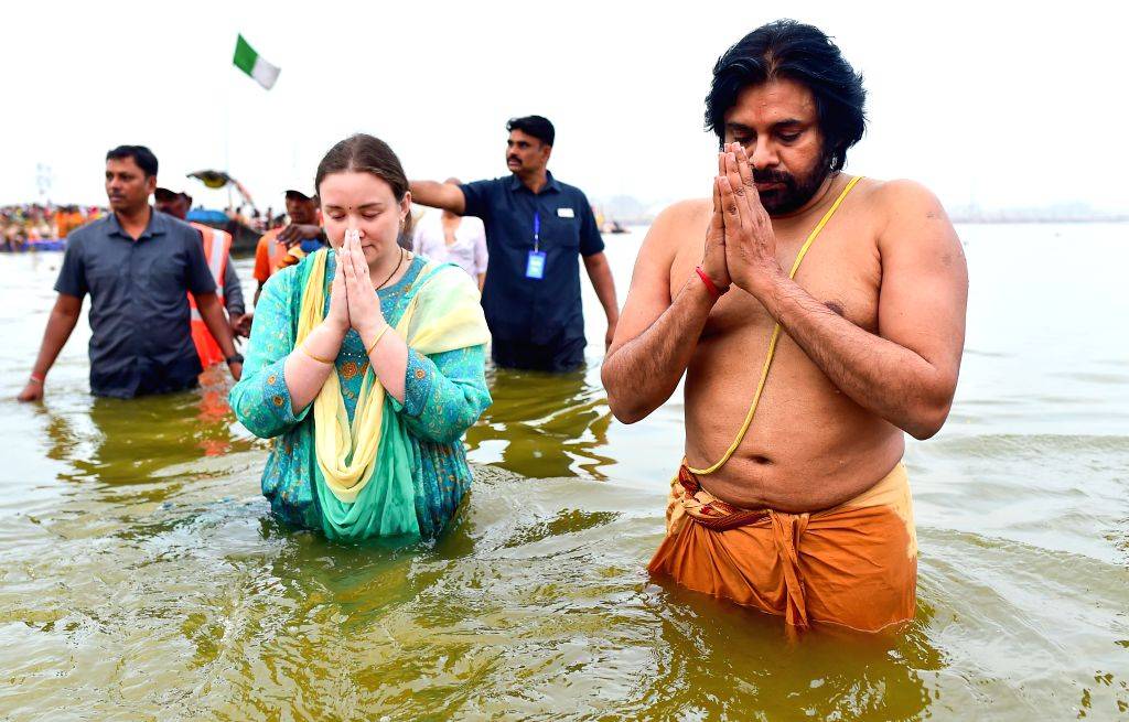 Pawan Kalyan Performs Holy Dip at Kumbh Mela with Family